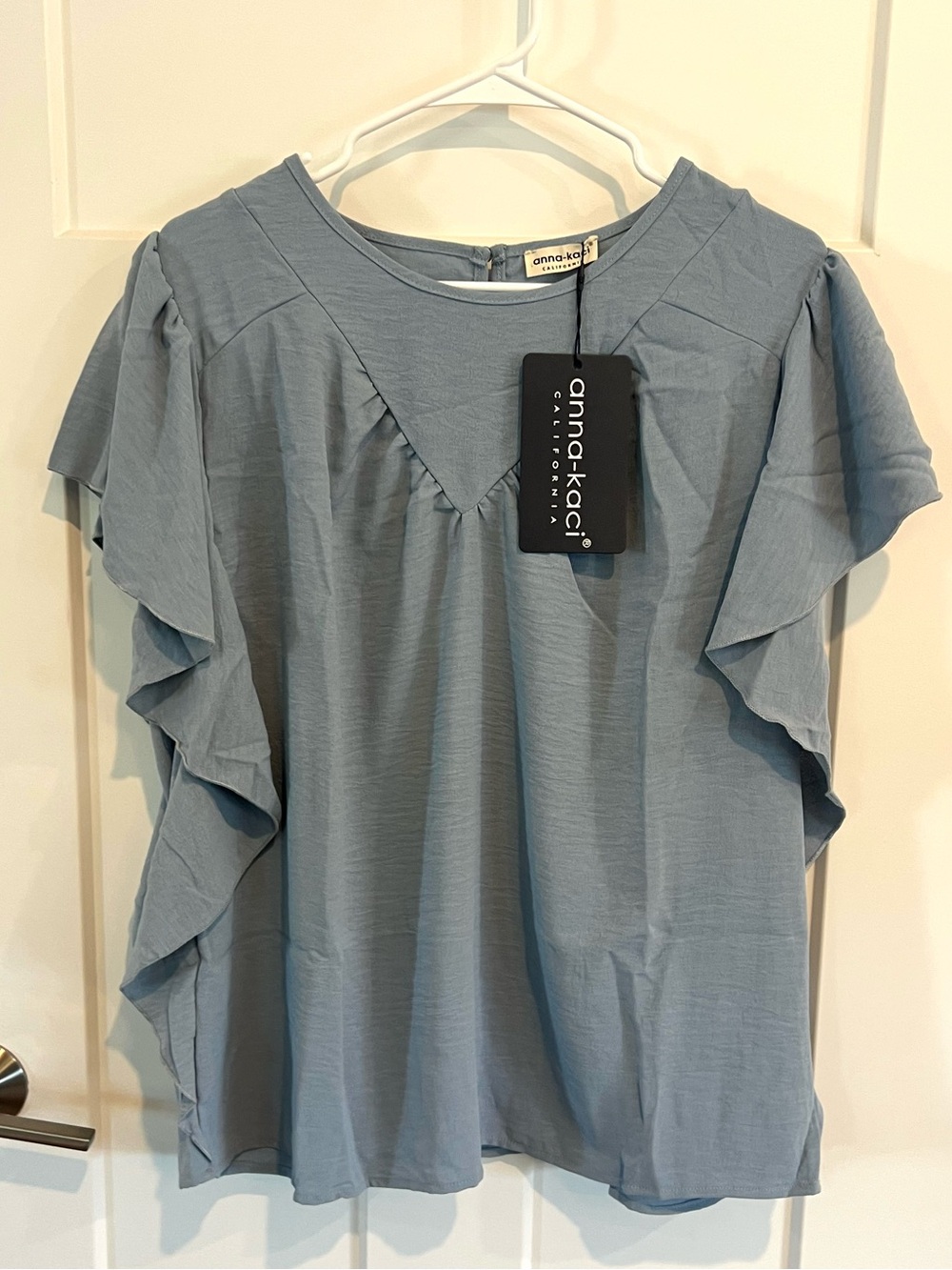 Nwt woman’s large Anna-Kaci Blue Ruffle Sleeveless Blouse